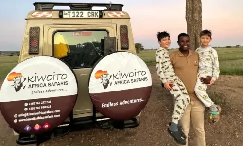 children with kiwoito africa safari guide on a family safari in serengeti national park